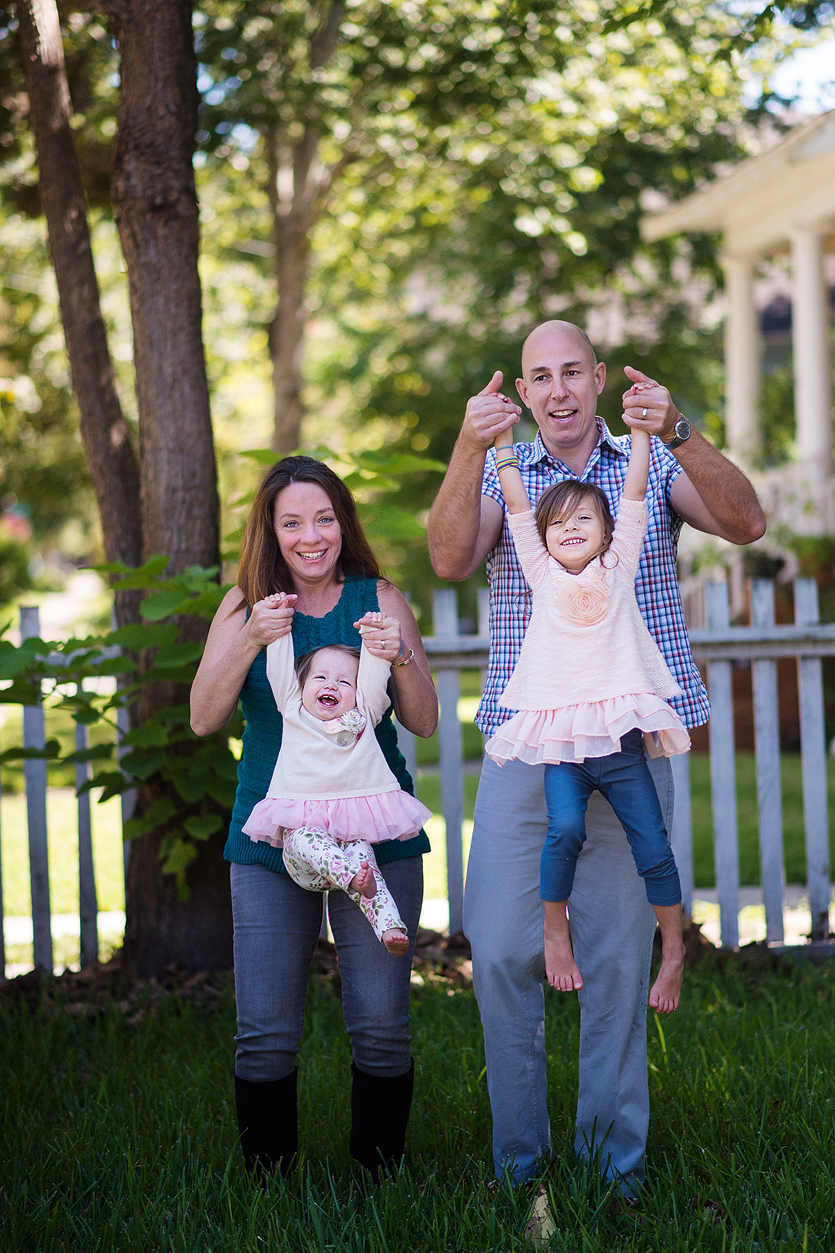 mom dad in photographs with kids