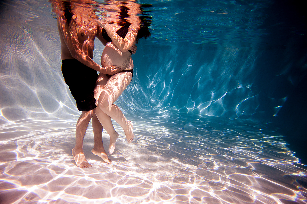 mom and dad in the pool