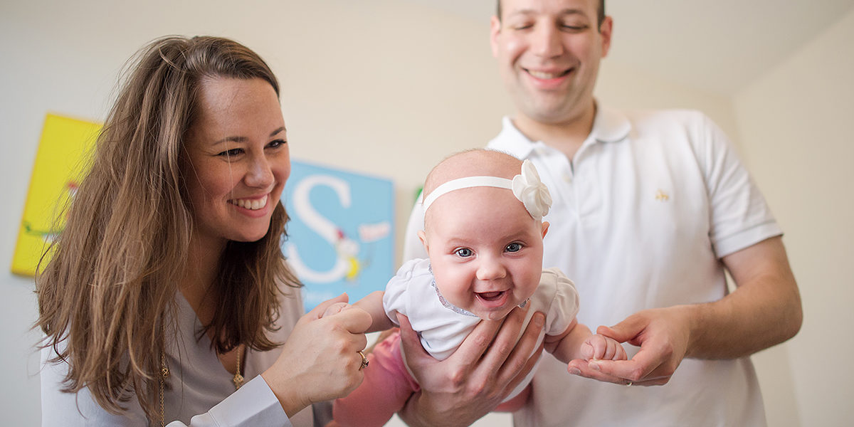 parents playing with baby houston tx family photography