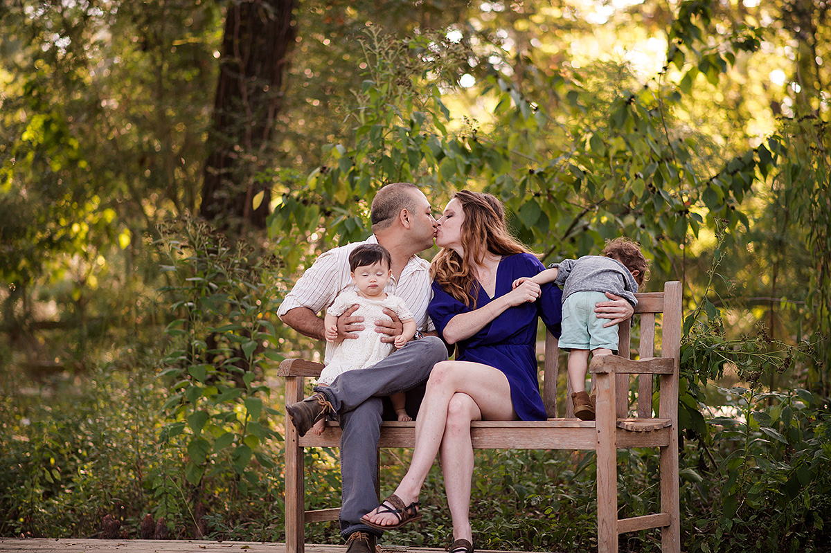 family has professional photographs taken at park in houston